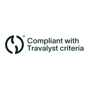 Travalyst Certs – TourCert Travalist Badge black on white with Logo and text which says "Compliant with Travalyst criteria"